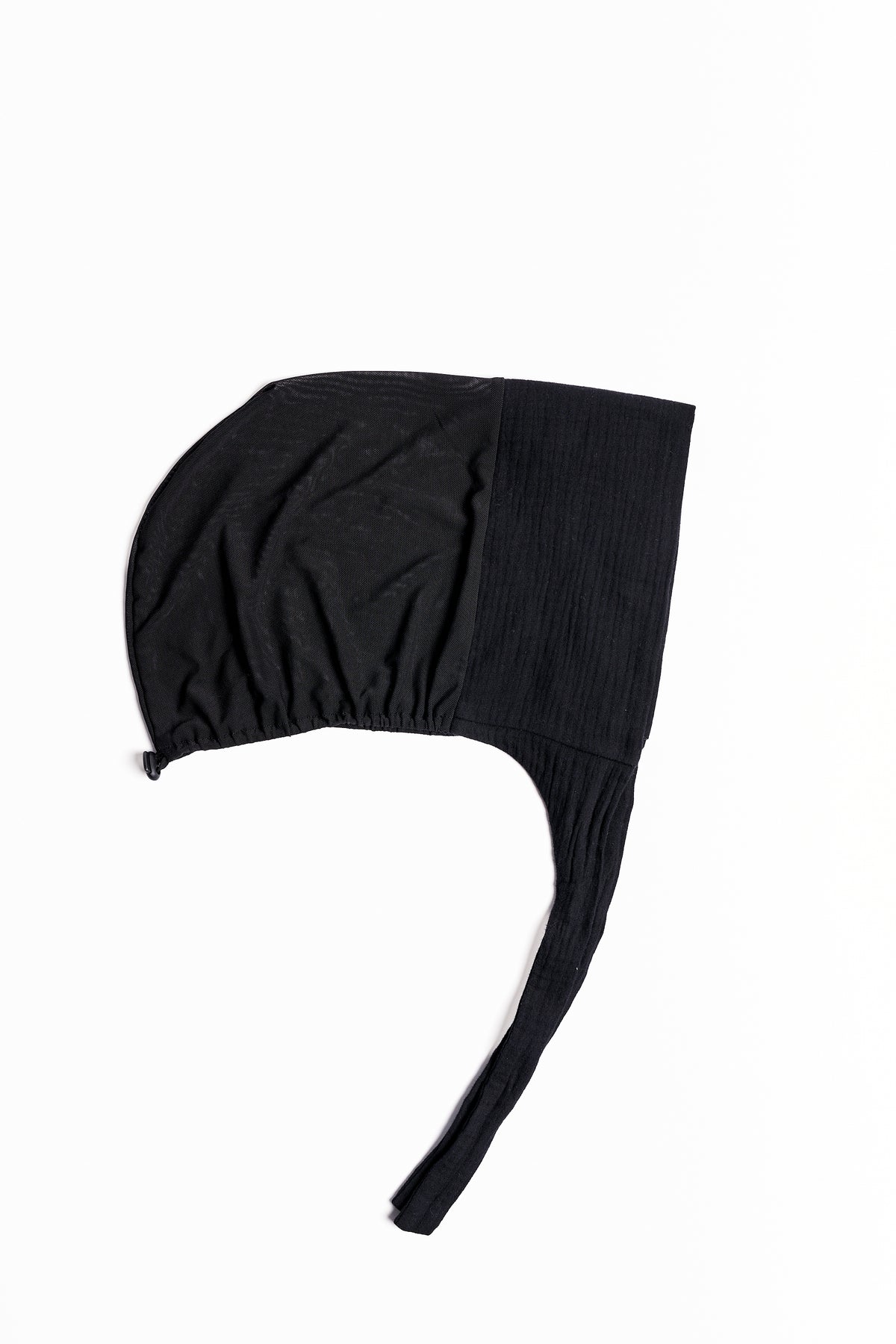 a black textured cotton mesh underscarf with ties shown flat against a light gray background.